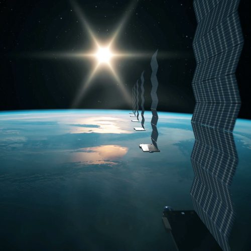 Silhouette view of a fleet of Internet starlink satellites in orbit above earth. A line of satellites providing internet connection from space with the sun in the horizon