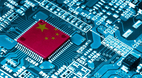 China flag print screen on Microchip processor on electronic board for important component in computer smartphone, China is the largest main manufacturing in the world of global supply chain concept.